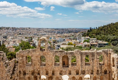 Herodes Atticus Odeon, Herodium ancient theater under the ruins of Acropolis, Greece, overlooking Athens city, sunny spring day, blue sky